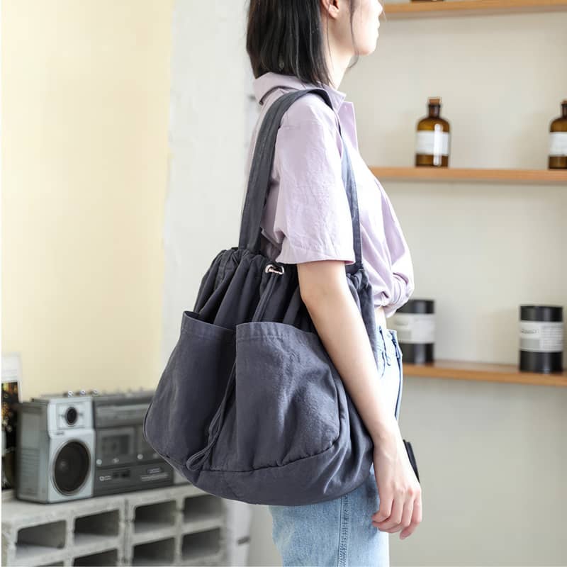 Canvas Shoulder Bag with Drawstring Closure and Single Strap Handle