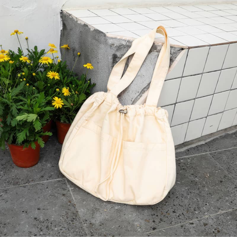 Canvas Shoulder Bag with Drawstring Closure and Single Strap Handle