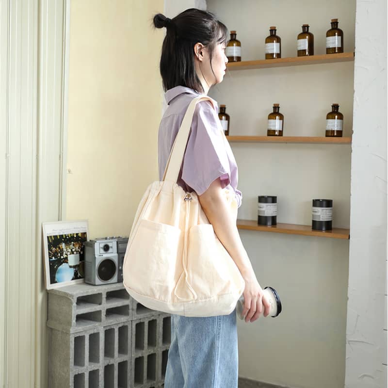 Canvas Shoulder Bag with Drawstring Closure and Single Strap Handle