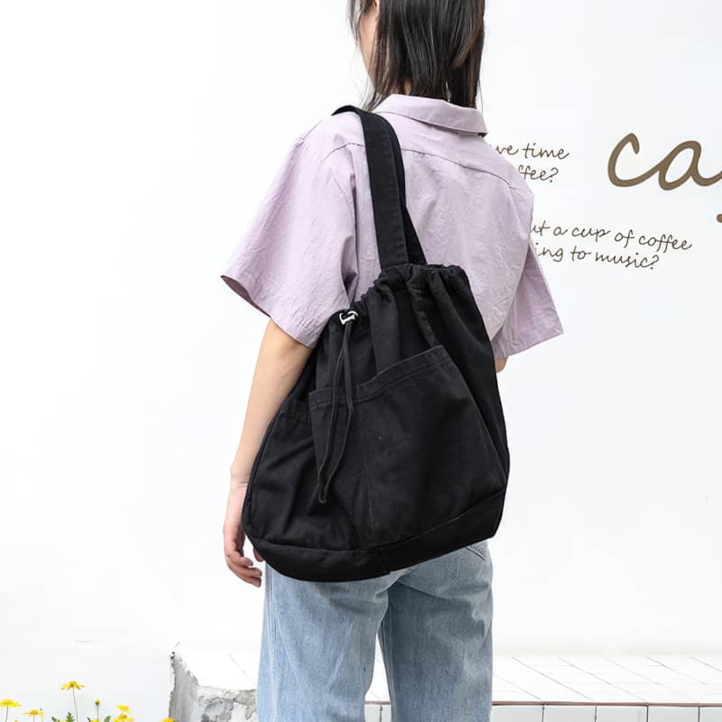 Canvas Shoulder Bag with Drawstring Closure and Single Strap Handle