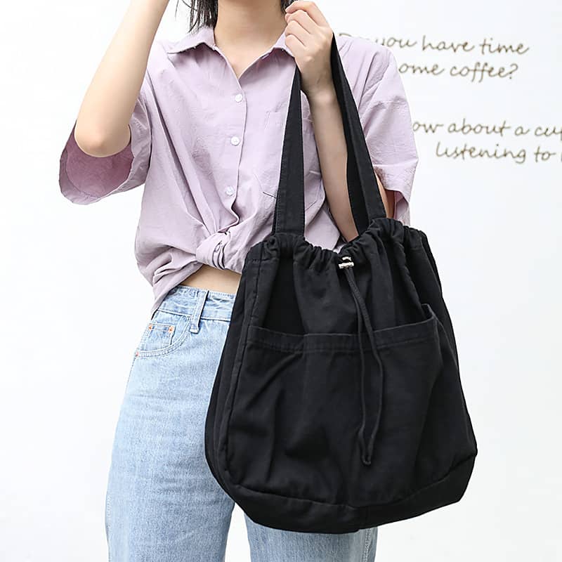 Canvas Shoulder Bag with Drawstring Closure and Single Strap Handle