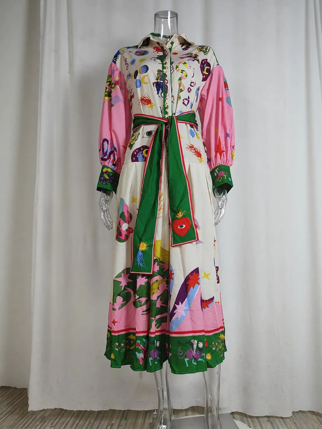 Colorful dress with animal prints on a mannequin against a white curtain background. #Color_Violet