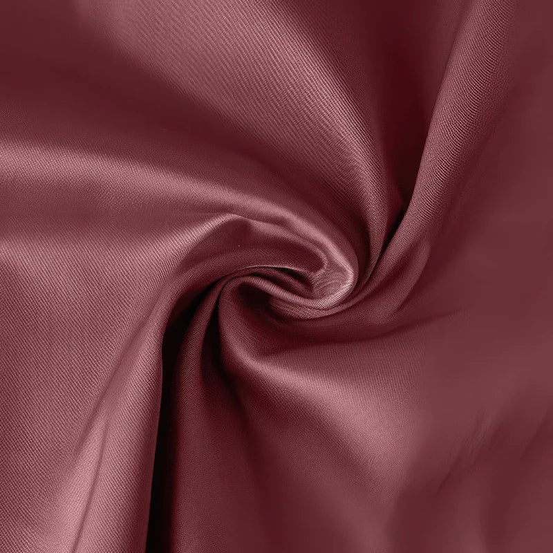Close-up of maroon fabric with folds. #Color_Red