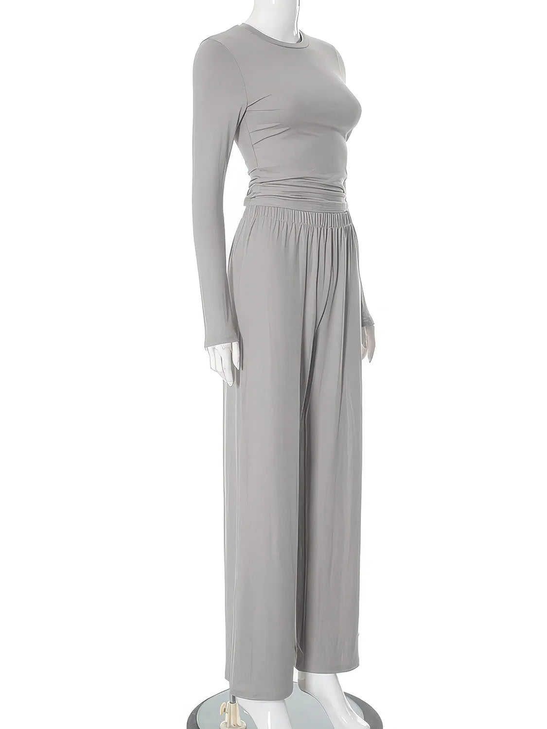 Gray long-sleeve dress on a mannequin against a white background. #Color_Gray
