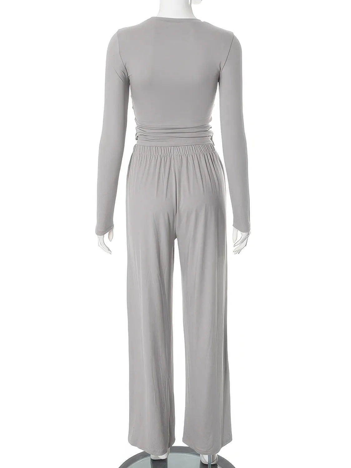 Gray jumpsuit on a mannequin against a white background. #Color_Gray