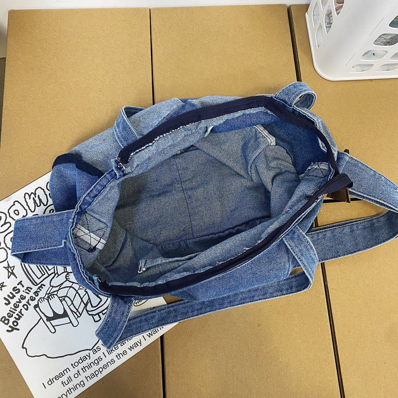 Paneled color contrast denim bag
