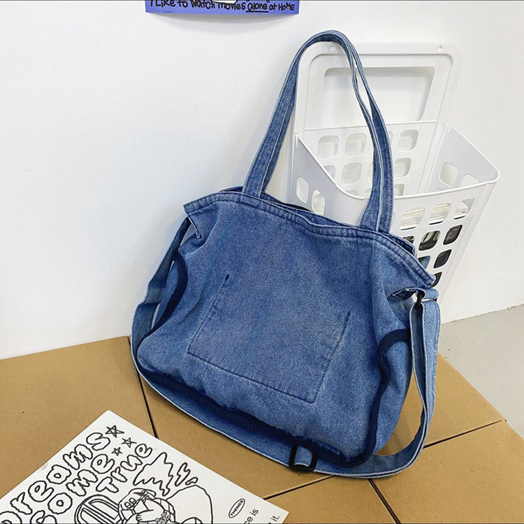 Paneled color contrast denim bag