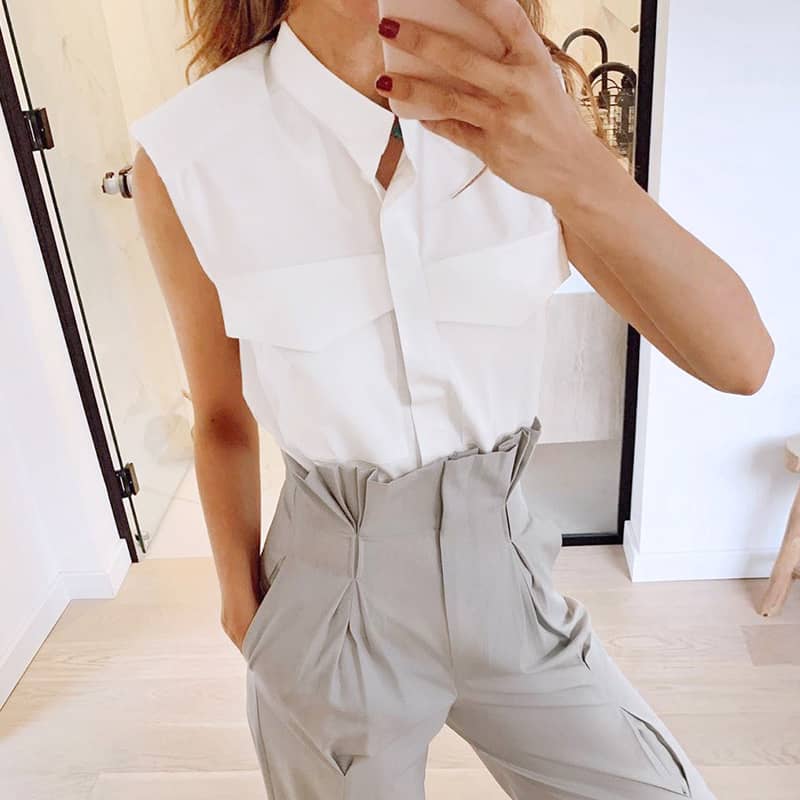 Women's white shoulder pad sleeveless shirt