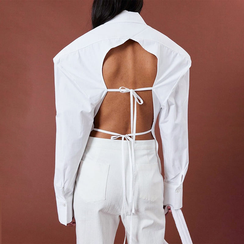 Women's backless shirt with shoulder pads