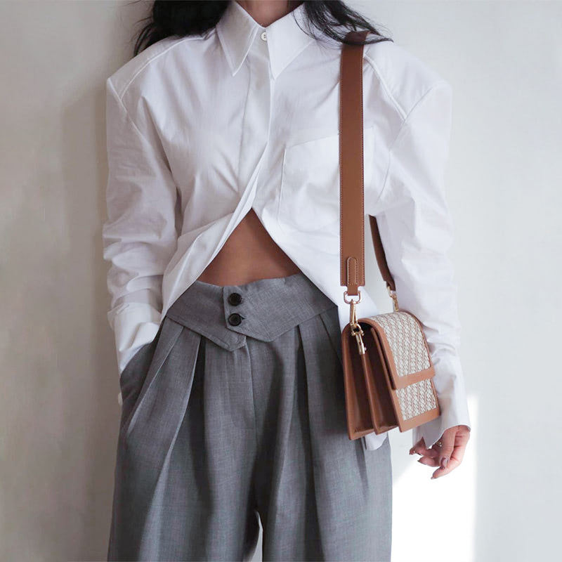 Women's backless shirt with shoulder pads