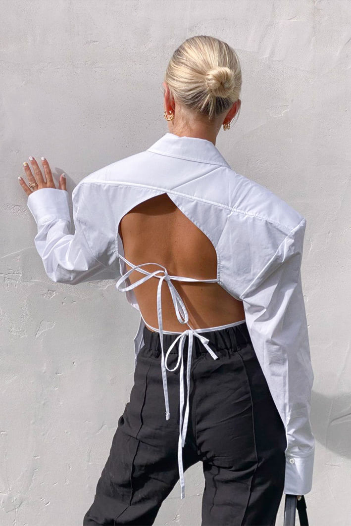 Women's backless shirt with shoulder pads