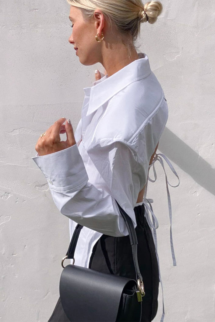 Women's backless shirt with shoulder pads