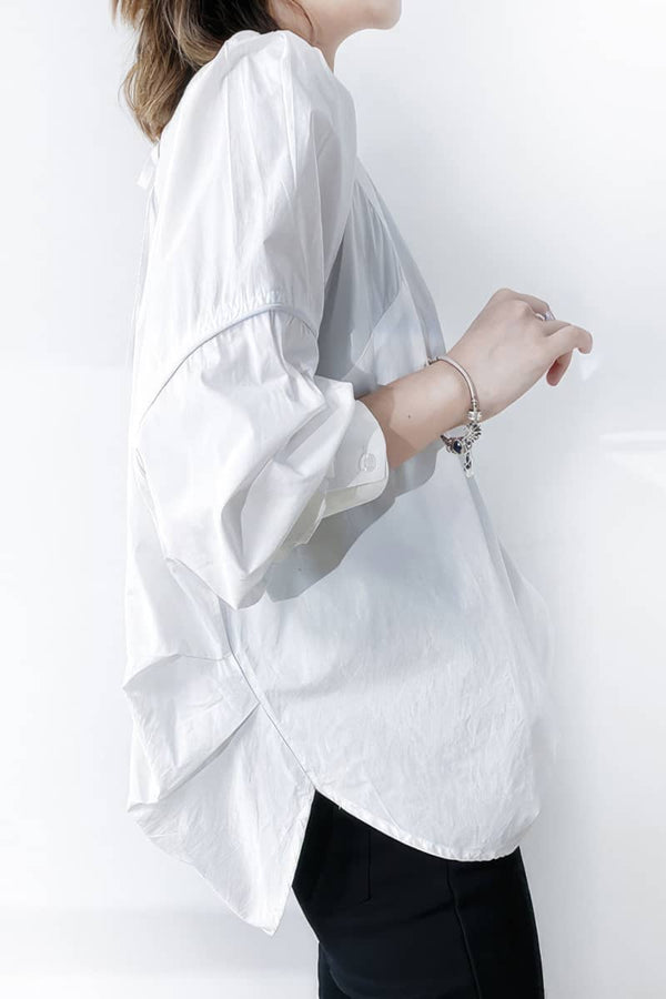 Irregular long-sleeved pullover top
