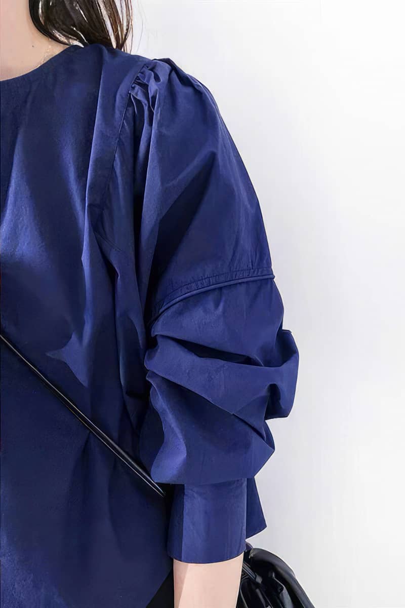 Irregular long-sleeved pullover top